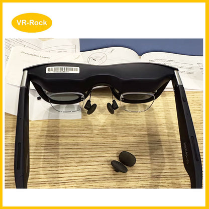 Xreal 1S prescription lenses installation photo - closeup of prescription inserts fitted into Xreal 1S AR frames.